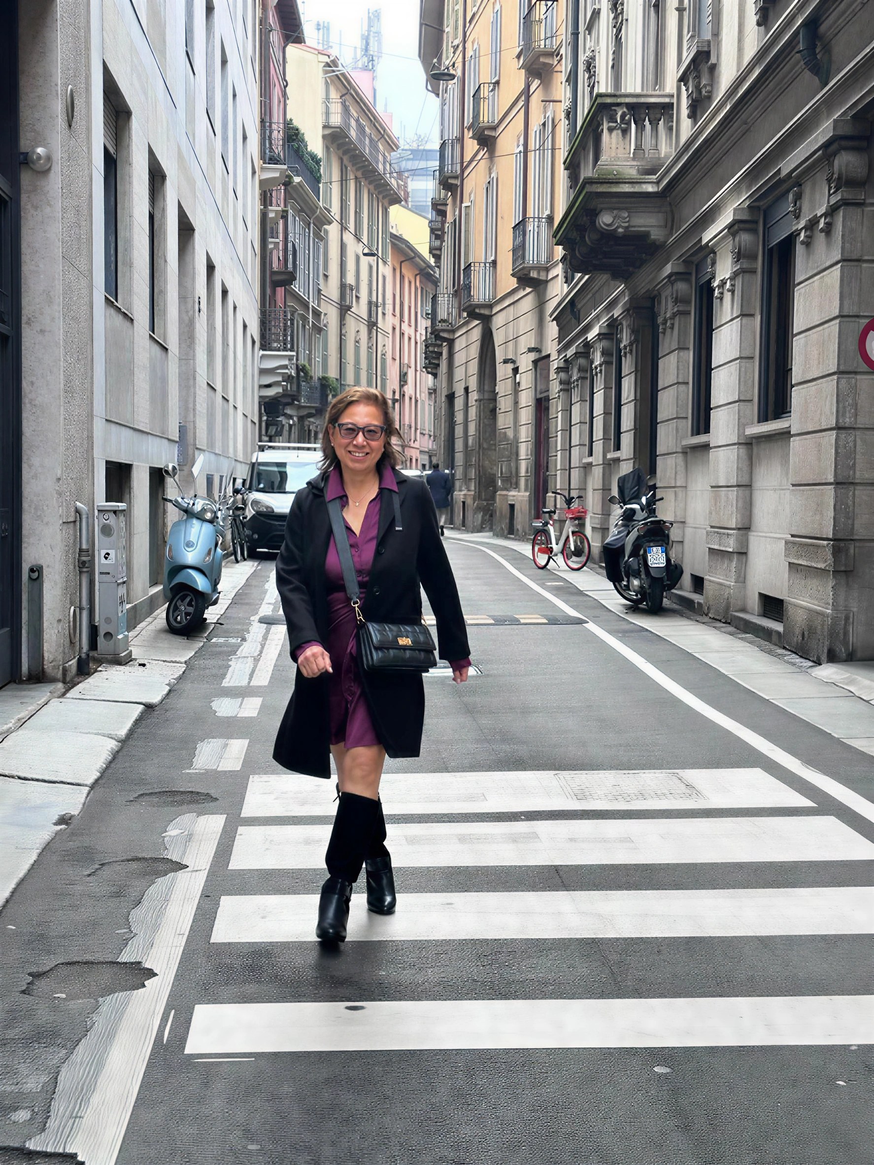 Iraida walking a street in Milan